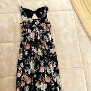 Floral long dress with cute bow on back.